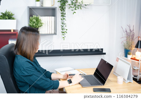 asian woman use laptop for working her business from home asian woman use laptop for working her business from home 116384279