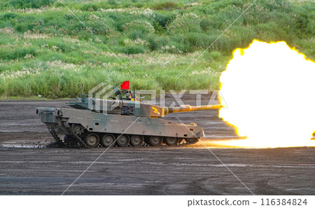 Japan Ground Self-Defense Force Type 90 tank firing at a training display 116384824