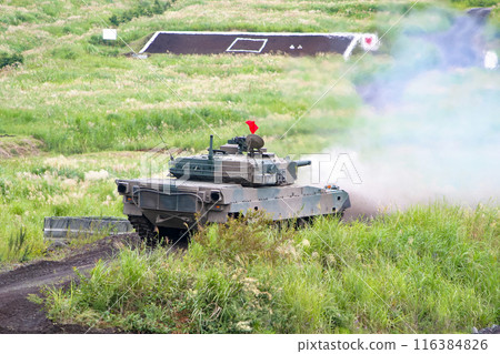 Japan Ground Self-Defense Force Type 90 tank firing at a training display 116384826