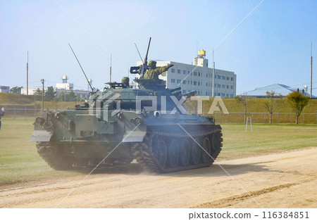 Ground Self-Defense Force Type 74 tank undergoing a review parade 116384851