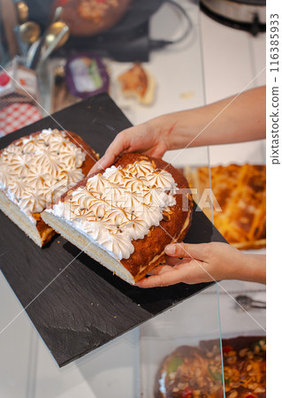 Cream-filled coke in a pastry shop. Vertical Cream-filled coke in a pastry shop. Vertical 116385933