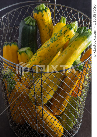 Yellow-green zucchini. Vegetables harvest. 116387550