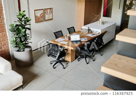 High angle shot of office in loft style, room full of furniture digital devices and houseplants High angle shot of office in loft style, room full of furniture digital devices and houseplants 116387925