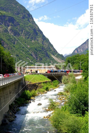 Mountain railways often have beautiful scenery. The Bernina Line also matches well with rivers and lakes. Mountain railways often have beautiful scenery. The Bernina Line also matches well with rivers and lakes. 116387931