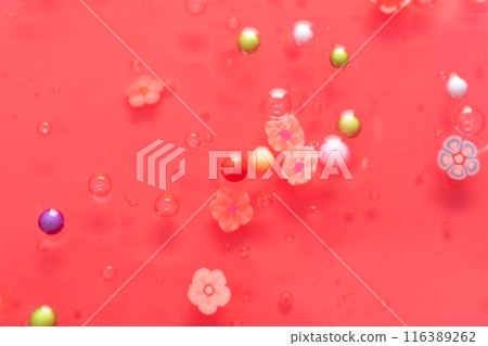 Colorful gel texture, clear skincare cream with bubbles and decorative figurines background, transparent beauty serum, colored cosmetic product close up Colorful gel texture, clear skincare cream with bubbles and decorative figurines background, transparent beauty serum, colored cosmetic product close up 116389262