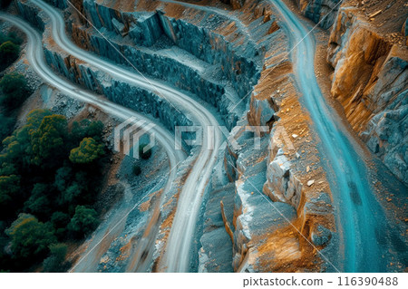 winding dirt road through Rock stockpiled . road in mining. Generative AI 116390488