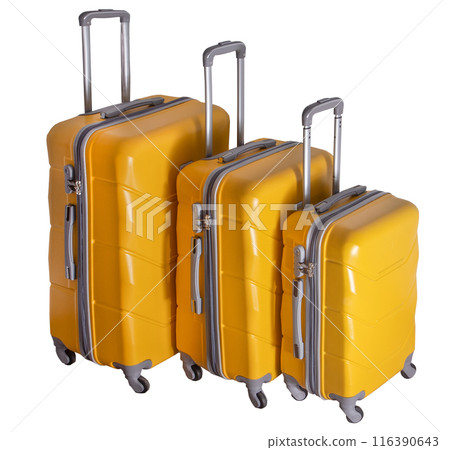 A set of yellow suitcases on wheels. Baggage. Travel suitcase isolated on white background A set of yellow suitcases on wheels. Baggage. Travel suitcase isolated on white background 116390643