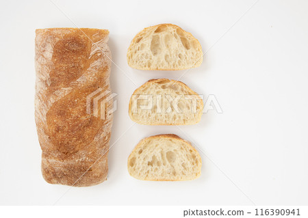 crusty baguette isolated on white background, top view 116390941