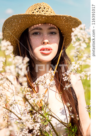 Summery portrait of gentle woman. 116391017