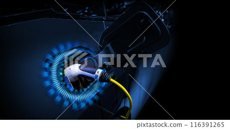 Power cable pump plug in charging power to electric vehicle EV car. Power cable pump plug in charging power to electric vehicle EV car. 116391265