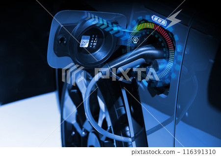Power cable pump plug in charging power to electric vehicle EV car. Power cable pump plug in charging power to electric vehicle EV car. 116391310