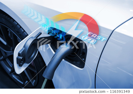 Power cable pump plug in charging power to electric vehicle EV car. 116391349