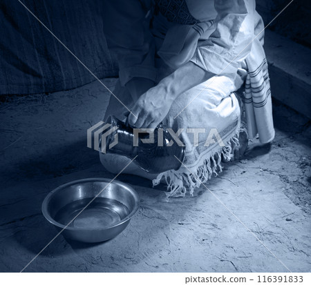 Male slave serve in the house pouring water Male slave serve in the house pouring water 116391833