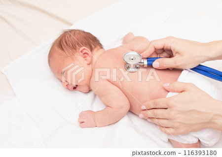 Doctor Examining Newborn with Stethoscope Doctor Examining Newborn with Stethoscope 116393180