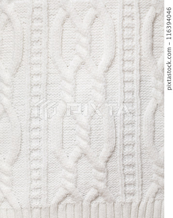 White cable knitting fabric textured background 116394046