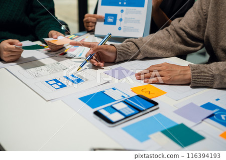 Creative team web designer feel happy work complete Teamwork planning application, success at work in the office concept. 116394193