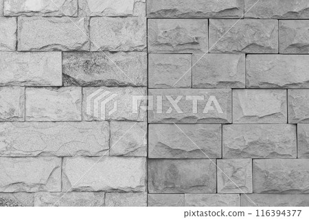 Grey stone wall brickwork brick wall masonry texture background pattern abstract old structure grunge 116394377