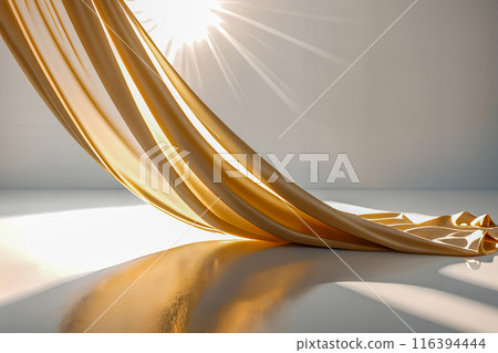 Gold fabric on a white background. Light is shining through it. 116394444
