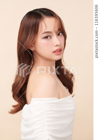 Beautiful young asian woman with clean fresh skin on beige background, Face care, Facial treatment, Cosmetology, beauty and spa, Asian women portrait. 116395606