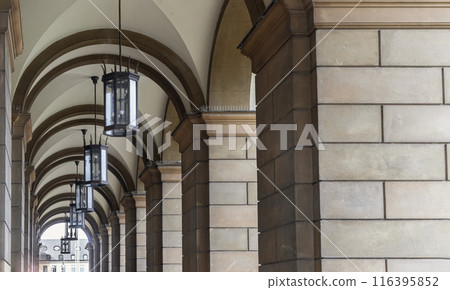 Perspective view of Stone archway walkway with lanterns outside the ballroom of the The Munich Residence building. Perspective view of Stone archway walkway with lanterns outside the ballroom of the The Munich Residence building. 116395852