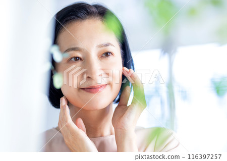 Beauty image of a middle-aged woman in her 50s Beauty image of a middle-aged woman in her 50s 116397257