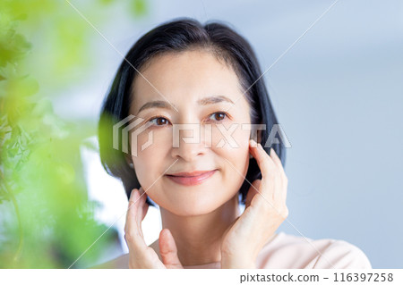 Beauty image of a middle-aged woman in her 50s Beauty image of a middle-aged woman in her 50s 116397258