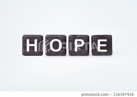 Hope word concept. hope on dark cubes on a white background Hope word concept. hope on dark cubes on a white background 116397426