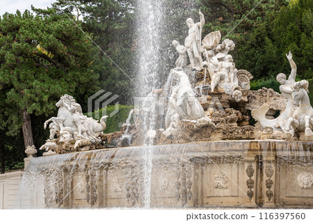 Vienna, Austria, August 20, 2022. In the gardens of Schonbrunn Palace, the historic greenhouse stands out for its characteristic design. Travel destinations. Copy space Vienna, Austria, August 20, 2022. In the gardens of Schonbrunn Palace, the historic greenhouse stands out for its characteristic design. Travel destinations. Copy space 116397560
