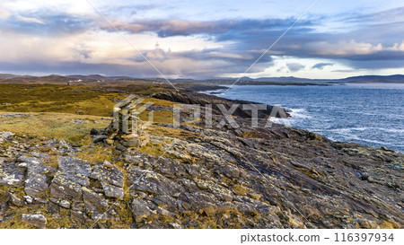 Aerial view a stone pillar at the beautiful coastline at Dawros in County Donegal - Ireland 116397934