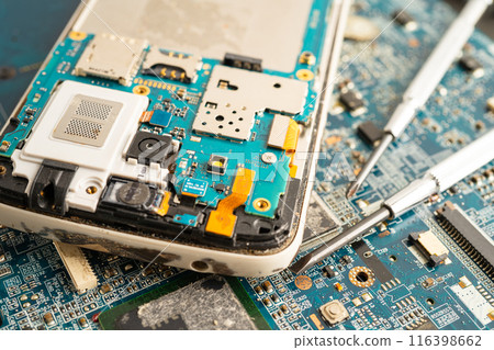 Repairing and upgrade circuit mainboard of notebook, electronic, computer hardware and technology concept. Repairing and upgrade circuit mainboard of notebook, electronic, computer hardware and technology concept. 116398662