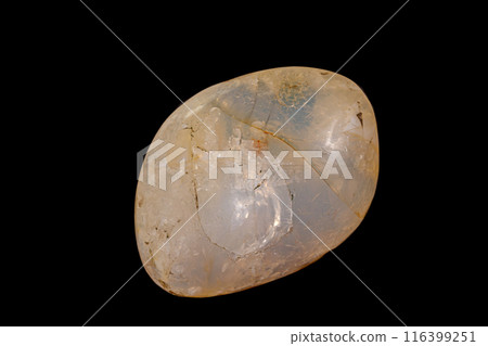 Macro stone opal mineral on a black background 116399251
