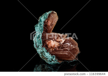 Macro of a stone Albite mineral on a black background Macro of a stone Albite mineral on a black background 116399644