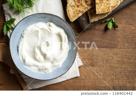 Homemade Yogurt Labneh Cheese Dip and Pita 116401442