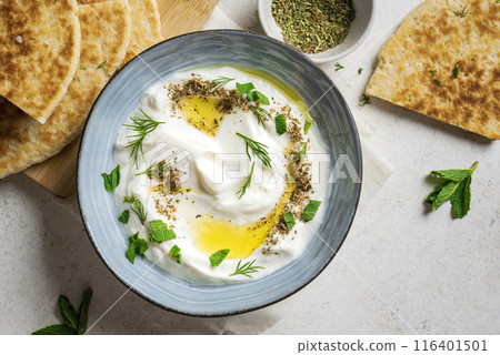 Labneh yogurt cream cheese dip with pita bread Labneh yogurt cream cheese dip with pita bread 116401501