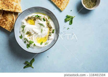 Labneh yogurt cream cheese dip with pita bread Labneh yogurt cream cheese dip with pita bread 116401504