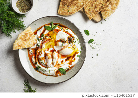 Turkish eggs Cilbir, Turkish breakfast 116401537