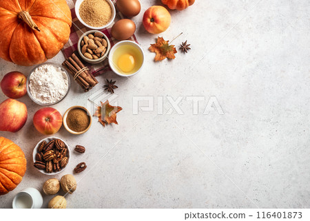 Autumn baking background with pumpkins, apples, nuts 116401873