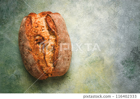 fresh bread ,sourdough, oval shape, top view, rustic style, 116402333