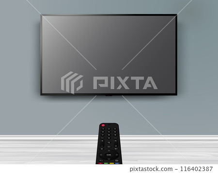 Watching online TV with remote control. Remote control is pointed at the modern flat screen TV on the wall. 116402387