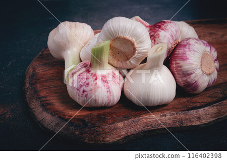 Fresh young garlic, white and purple color, on a wooden table, no people, Fresh young garlic, white and purple color, on a wooden table, no people, 116402398