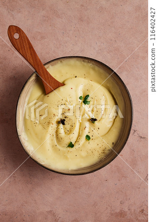 Mashed potatoes, with micro greenery and spices, homemade, on a beige table, no people, top view, 116402427