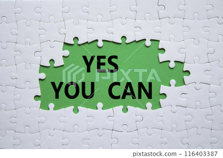 Yes You Can symbol. Concept word Yes You Can on white puzzle. Beautiful green background. Business and Yes You Can concept. Copy space. Yes You Can symbol. Concept word Yes You Can on white puzzle. Beautiful green background. Business and Yes You Can concept. Copy space. 116403387
