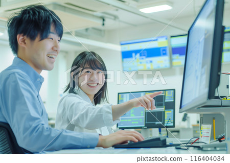 Female engineer pointing at blueprint_3 Female engineer pointing at blueprint_3 116404084