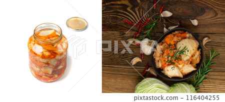 Kimchee in black bowl on wood table. Spicy kim chi pile, hot fermented napa cabbage, traditional jimchi 116404255