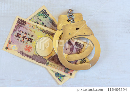 An economic crime associated with corruption illegal profits using Japanese yen is handcuff placed by police An economic crime associated with corruption illegal profits using Japanese yen is handcuff placed by police 116404294
