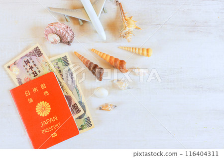 Flight travelling an Japanese yen cash bills Japan passport in airplane 116404311