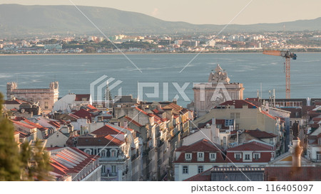 Aerial view of Lisboa downtown timelapse during sunset. Panoramic of Baixa, Rossio and Chiado red rooftops from above. Portugal 116405097