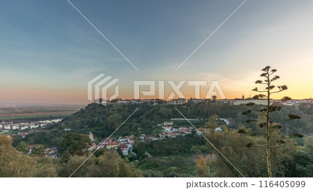 Panorama showing sunset over the Castle of Almourol on hill in Santarem aerial timelapse. Portugal 116405099