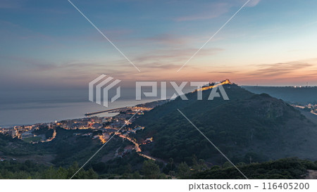 Panorama showing aerial view of Sesimbra Town and Port day to night timelapse, Portugal. Panorama showing aerial view of Sesimbra Town and Port day to night timelapse, Portugal. 116405200