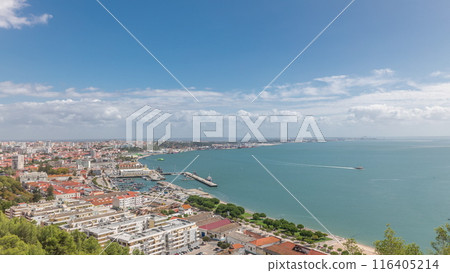 Panorama showing aerial view of marina and city center timelapse in Setubal, Portugal. 116405214